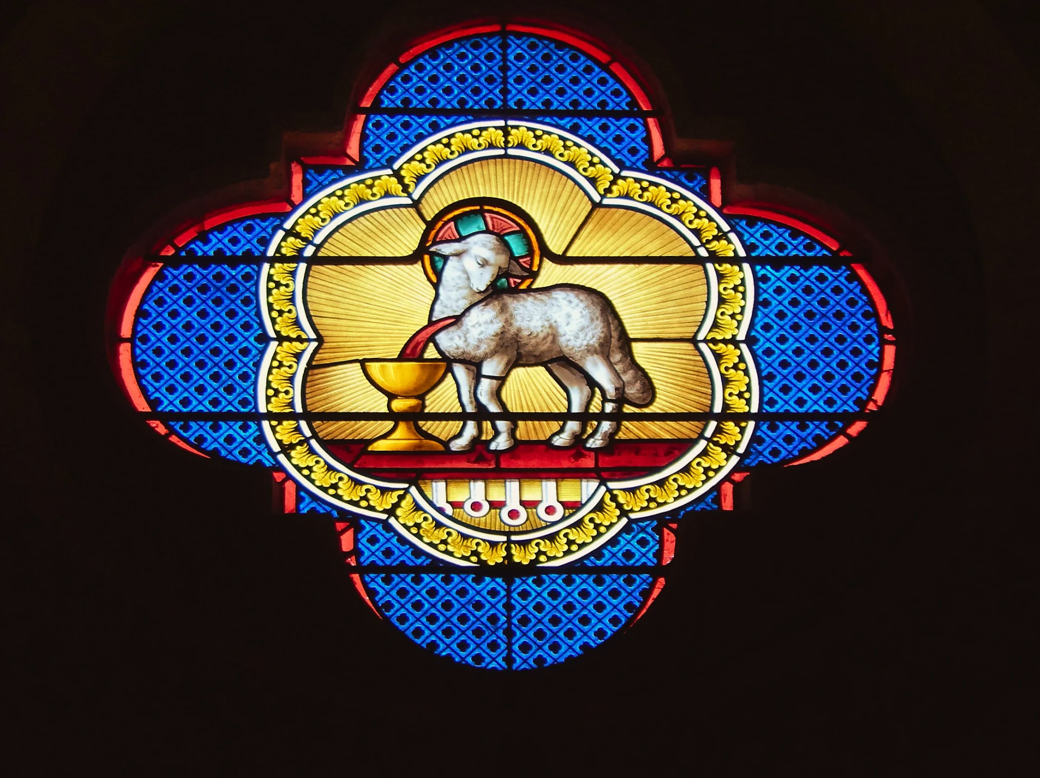 Zafer sancağı taşıyan kurban kuzusu (Agnus Dei) sembolü